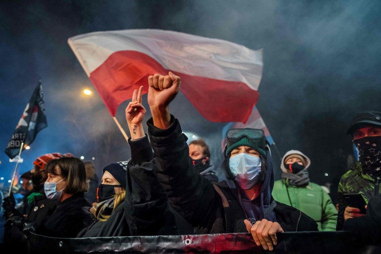 Image: A demonstrator gestures as people take part in a pro-choice protest in the center of Warsaw,