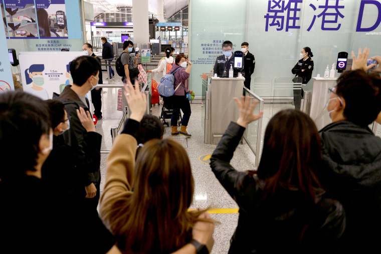 The Wider Image: Leaving Hong Kong: A family makes a wrenching decision