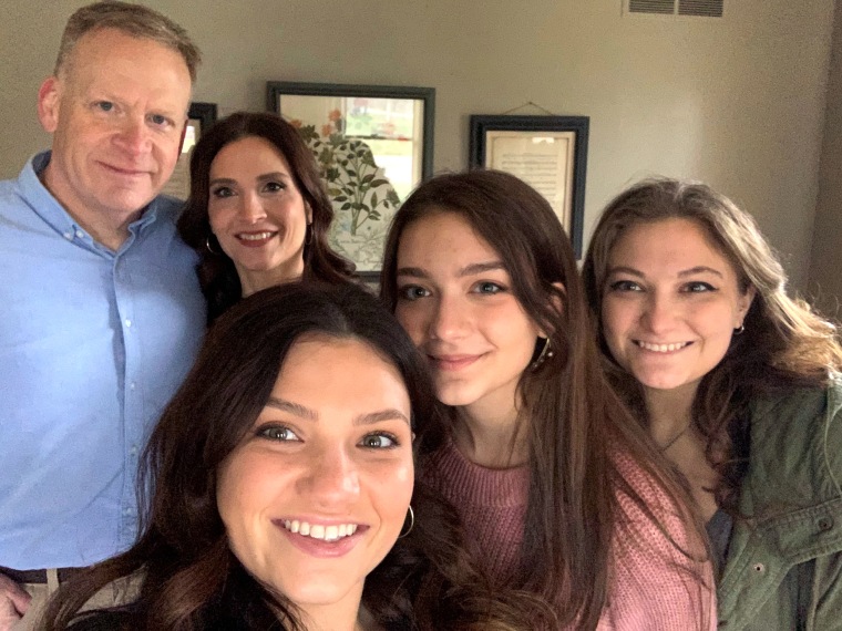 Parry with his wife and three daughter.