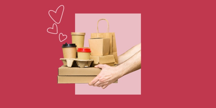 Hands holding various take-out food containers, pizza box, coffee cups in holder and paper bag isolated on white. Food delivery service
