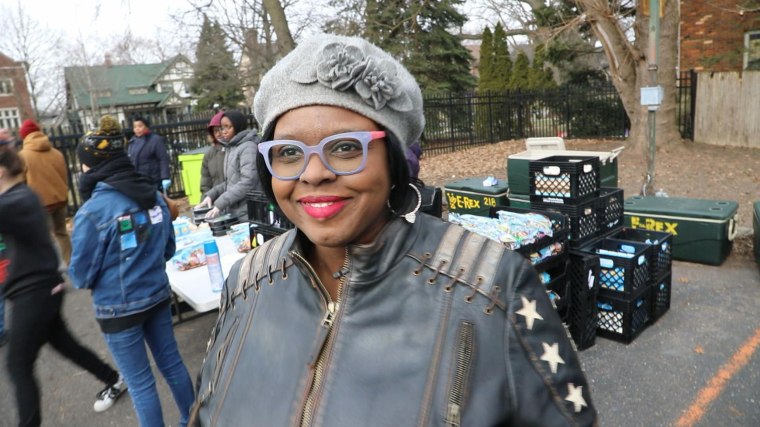Kinda Makini-Anderson runs Inner City Youth Group, a small nonprofit serving Detroit's East Side. Makini-Anderson is pictured at a food distribution she ran in March.