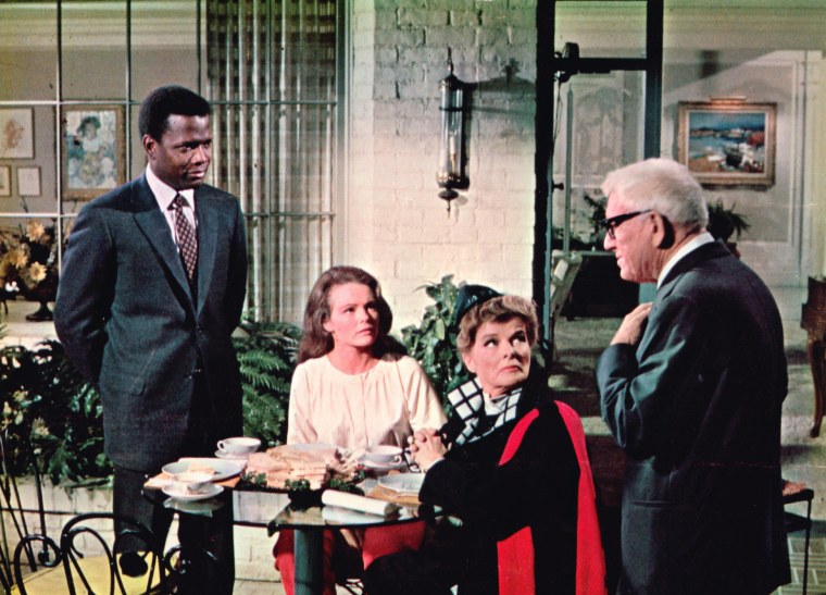 Sidney Poitier, Katharine Houghton, Katharine Hepburn and Spencer Tracy in the 1967 movie "Guess Who's Coming to Dinner."