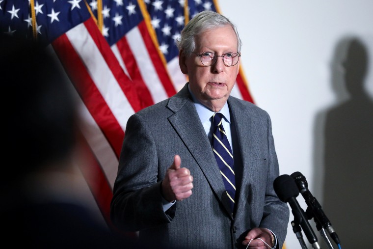 Image: Senate Minority Leader McConnell speaks to reporters on Capitol Hill in Washington