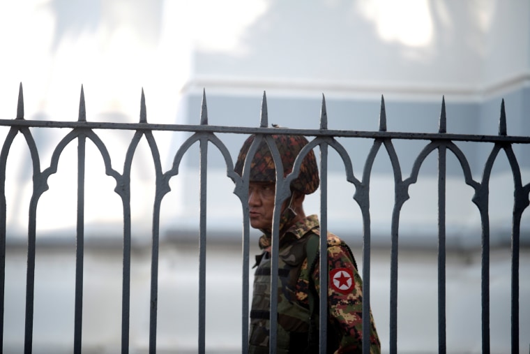 Image: A Myanmar soldier near city hall in Yangon