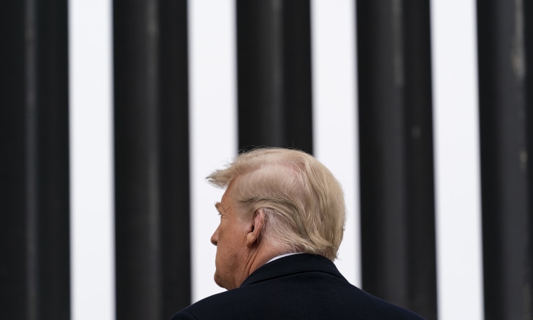 Image: Donald Trump looking at a section of the U.S.-Mexico border wall