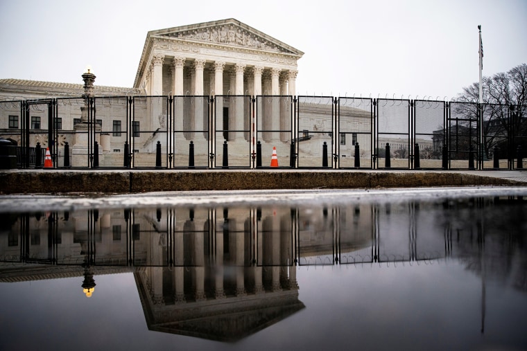 Image: FILE PHOTO: Barbed wire and security fencing surrounds the U.S. Supreme Court in Washington