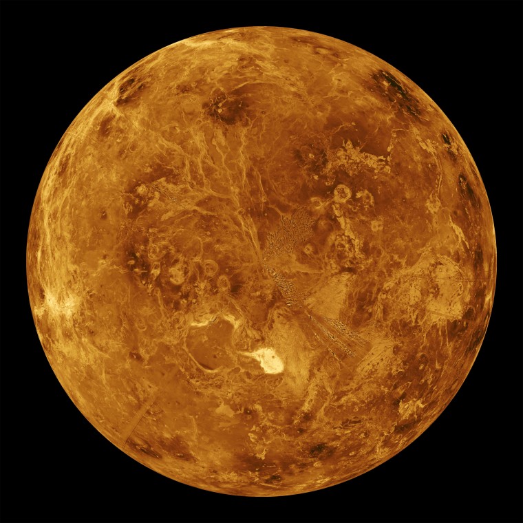 The Magellan probe that orbited Venus from 1990 to 1994 was able to peer through the thick Venusian clouds and build up the above image by emitting and re-detecting cloud-penetrating radar.