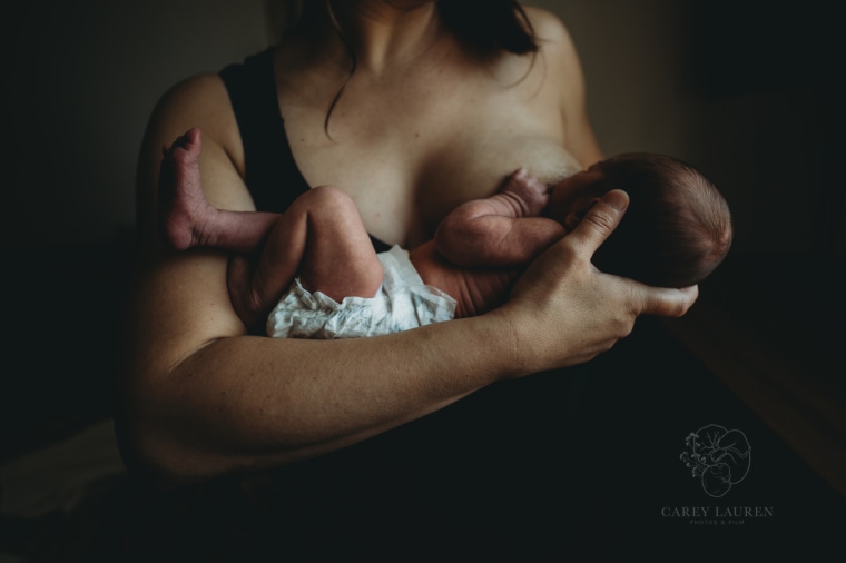 Winner, Best in Fresh 48: "Nursing a Newborn" from Carey Lippert of Carey Lauren Photos and Film.