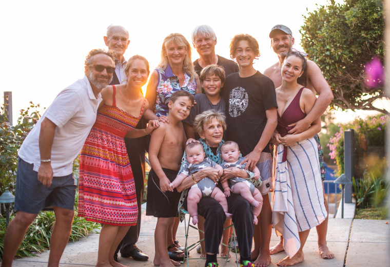 Eger, seated in the center, is surrounded by her family. Her mother once told her: “No one can take away from you what you’ve put in your mind.”