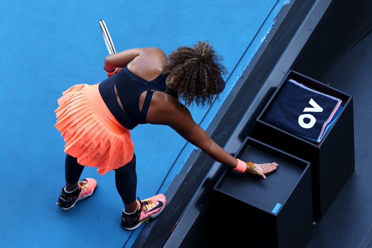 Naomi Osaka of Japan has a butterfly land on her hand in her Women's Singles third round match against Ons Jabeur of Tunisia during day five of the 2021 Australian Open at Melbourne Park on February 12, 2021 in Melbourne, Australia.