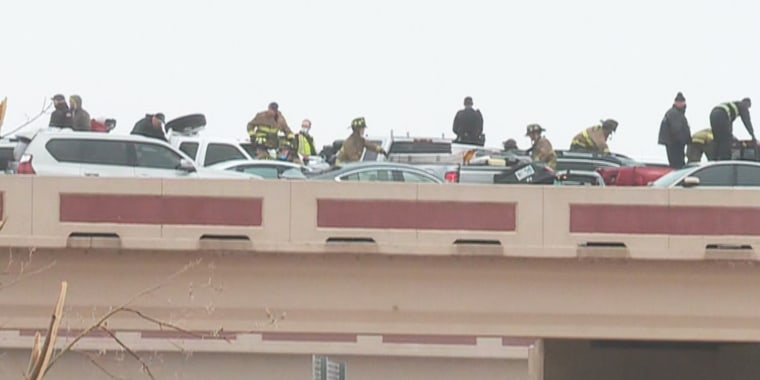 Emergency workers respond to a 15-car pileup on an interstate in Oklahoma City on Monday.
