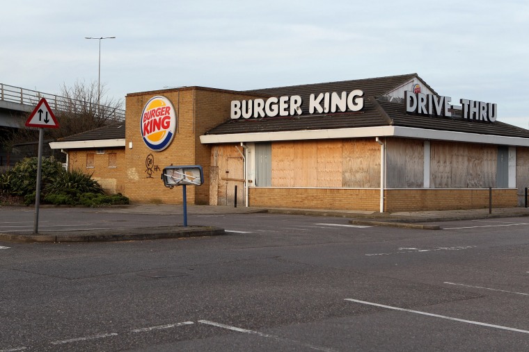 Image: A former Burger King restaurant stands boarded-up in the borough of Barking and Dagenham.
