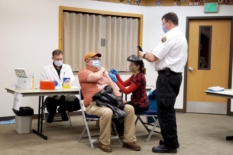 Residents of Sitka, Alaska, receive their Covid-19 vaccinations at the local fire hall during a immunization clinic run by Harry Race Pharmacy and White's Pharmacy earlier this year.