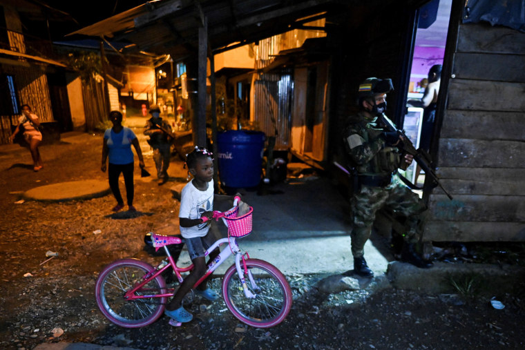 Image: Colombian Marine Infantry soldiers patrol the streets of Buenaventura, Colombia, on Feb. 10, 2021.