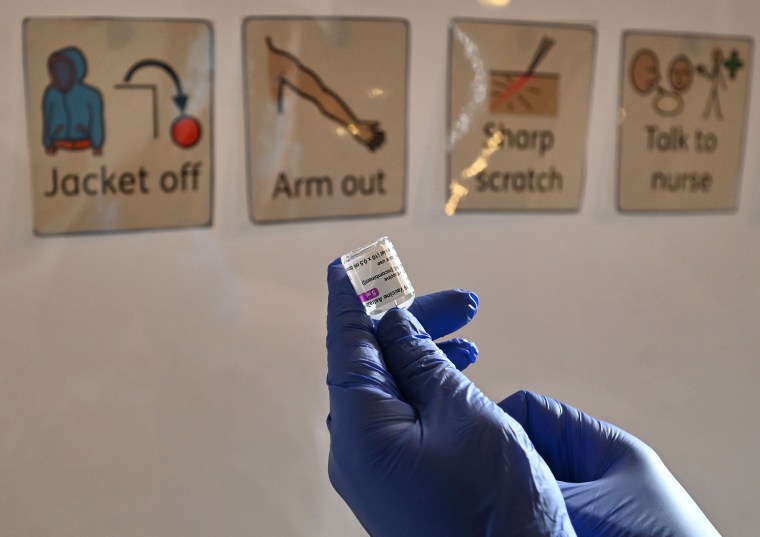 A health worker prepares a dose of the AstraZeneca/Oxford Covid-19 vaccine in Hull, England, on Feb. 10, 2021.