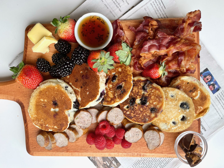 Put pancakes on a board and it instantly becomes a party.