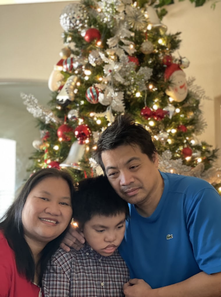 Hazel Canela with her son and husband. 