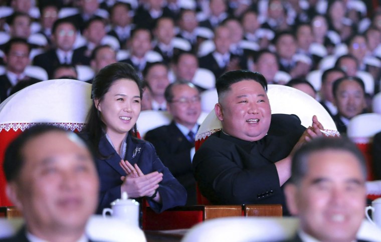 Image: North Korean leader Kim Jong Un and his wife Ri Sol Ju watch a performance marking birth anniversary of Kim Jong Il, Pyongyang, North Korea