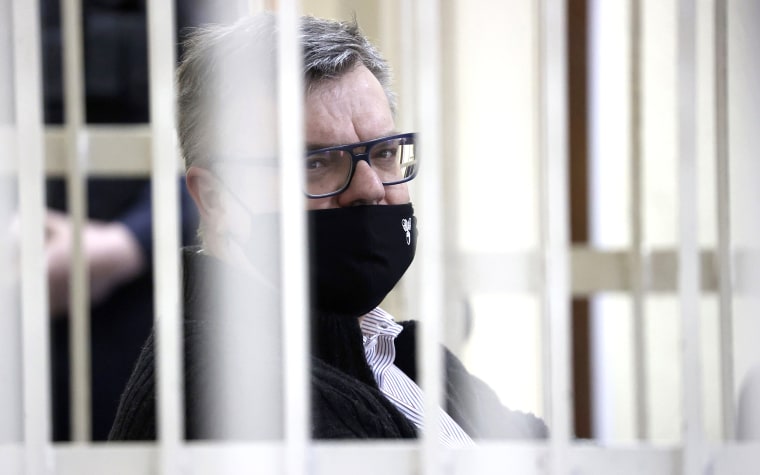 Image: Viktor Babariko, the former head of Russia-owned Belgazprombank, sits inside a cage in a court room in Minsk, Belarus, Wednesday, Feb. 17, 2021.
