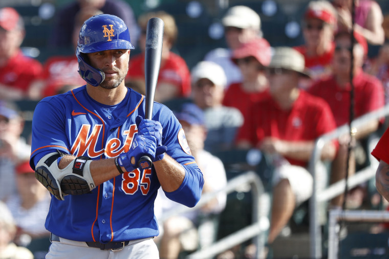 Image: Tim Tebow #85 of the New York Mets looks on before stepping to the plate to bat against the St Louis Cardinals during a Grapefruit League spring training game at Roger Dean Stadium.