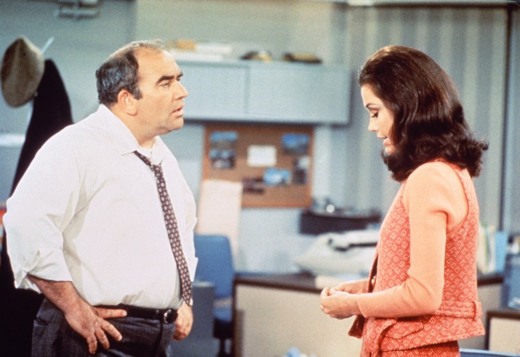 Ed Asner as Lou Grant and Mary Tyler Moore as Mary Richards in a scene from "The Mary Tyler Moore Show" in 1970.