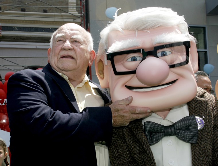 Image: Ed Asner and character at the premiere of the Disney-Pixar animated film "Up" in Hollywood