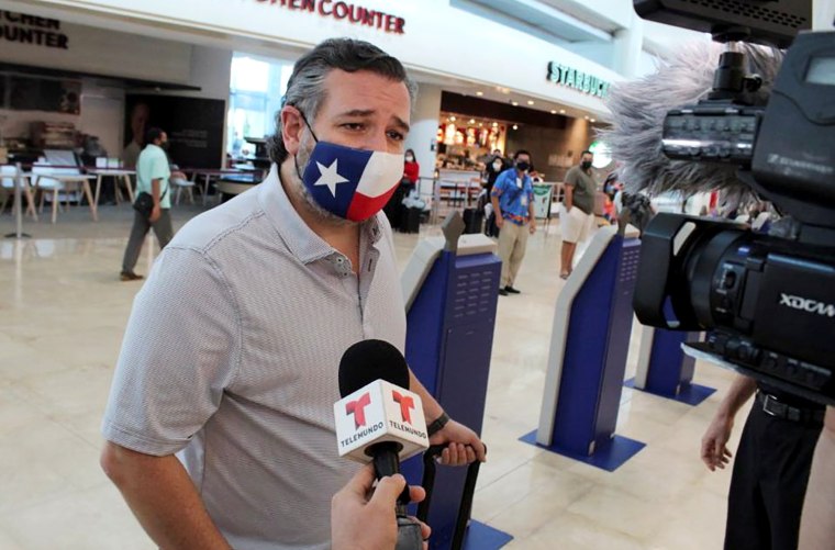 Image: U.S. Senator Ted Cruz (R-TX) speaks to the media at the Cancun International Airport before boarding his plane back to the U.S., in Cancun