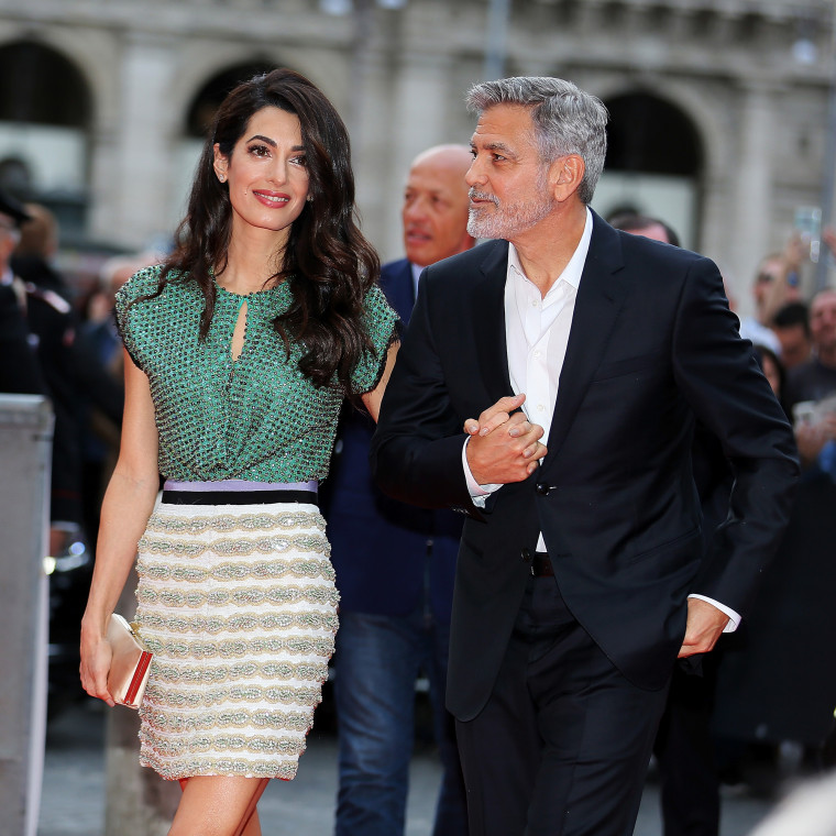 Amal and George Clooney in 2019 at 'Catch-22' Rome Premiere