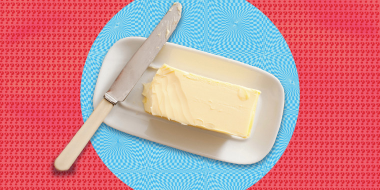 Butter dish on color background