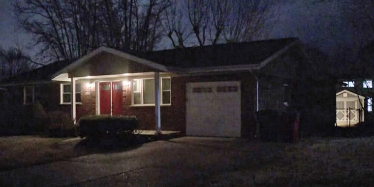 The house where neighbors say an 11-year-old girl found her parents dead from COVID-19 in St. Louis County, Mo.