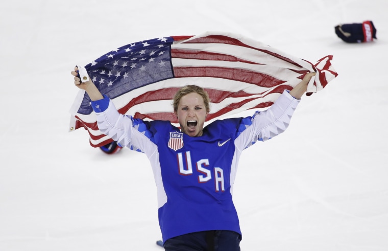 Image: Jocelyne Lamoureux-Davidson celebrates after Team USA defeated Canada in a 3-2 victory during the gold medal match on Feb. 22, 2018.