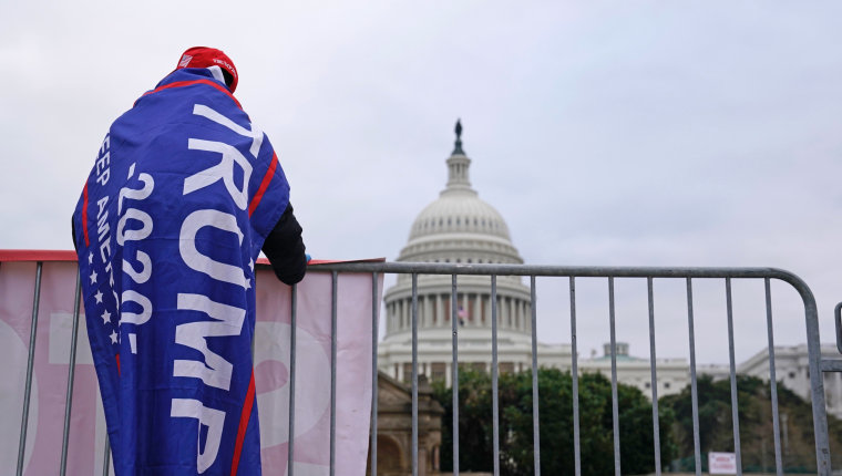 Supporters of President Donald Trump arrive for a rally on the Ellipse outside of the White House on Jan. 6, 2021.