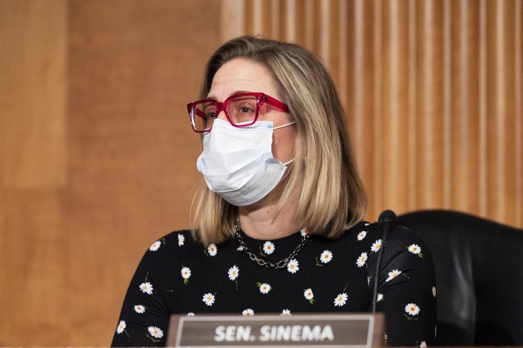 Sen. Kyrsten Sinema, D-Ariz., participates in a meeting of the Senate Homeland Security and Governmental Affairs Committee on Feb. 10, 2021.