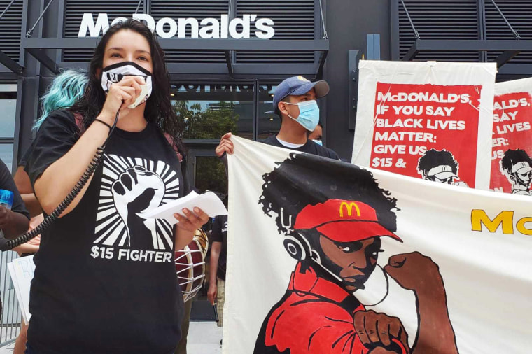 Image: Adriana Alvarez protests outside a McDonald's.