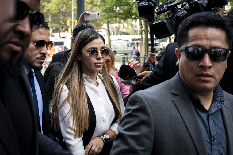 Emma Coronel Aispuro, wife of Joaquin "El Chapo" Guzman, is surrounded by security as she arrives at federal court on July 17, 2019 in New York City.