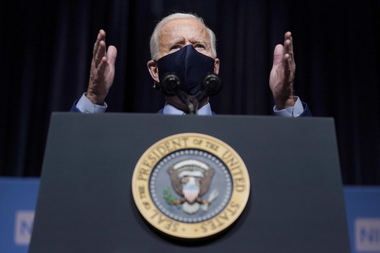 Image: President Joe Biden speaks during a visit to the Viral Pathogenesis Laboratory at the National Institutes of Health in Bethesda, Md.