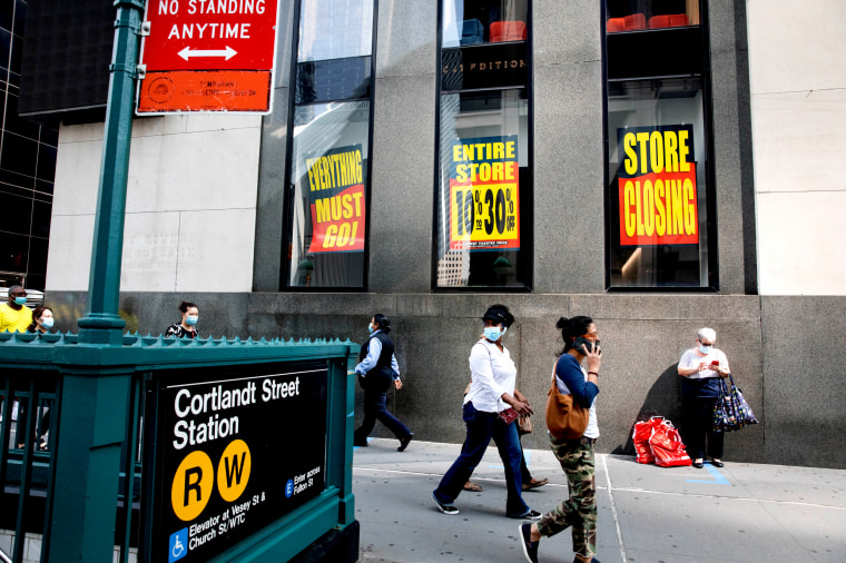 A \"Store Closing\" sign is displayed outside a Century 21 department store in New York on Sept. 14, 2020.