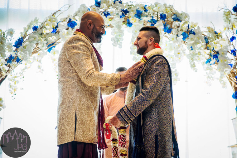 Image: Sunil Ayyagari, left, exchanges garlands with his husband, Stephen Shinsky, at their wedding in Philadelphia in 2019
