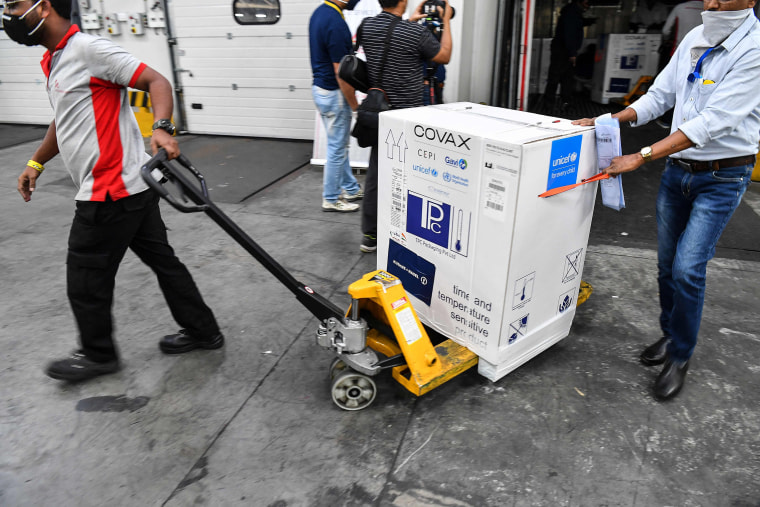 Image: The AstraZeneca vaccine made by the Serum Institute of India is unloaded at Mumbai airport this week as part of the COVAX rollout.