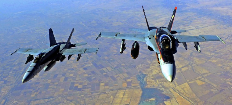 Image: Two U.S. Navy Super Hornets are seen being refueled over Iraq in 2014.