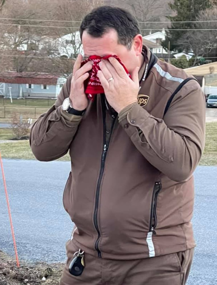 UPS driver Chad Turns becomes emotional after receiving surprise from route residents.