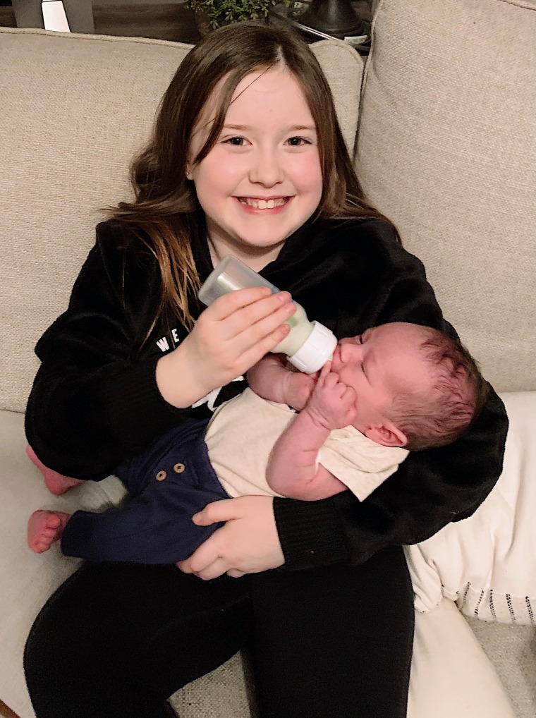 The Umezus' two living children, Sophie, 9, and Jacob, 1 month.