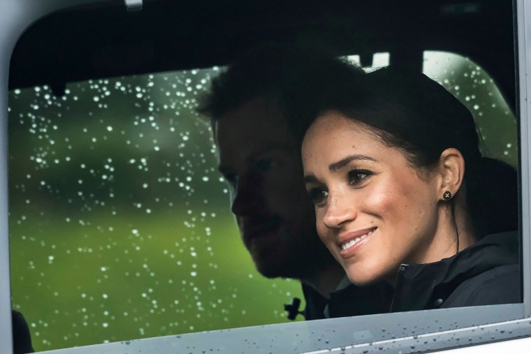 Image: Britain's Prince Harry and his wife Meghan, Duchess of Sussex arrive at The North Shore Riding Club in Auckland