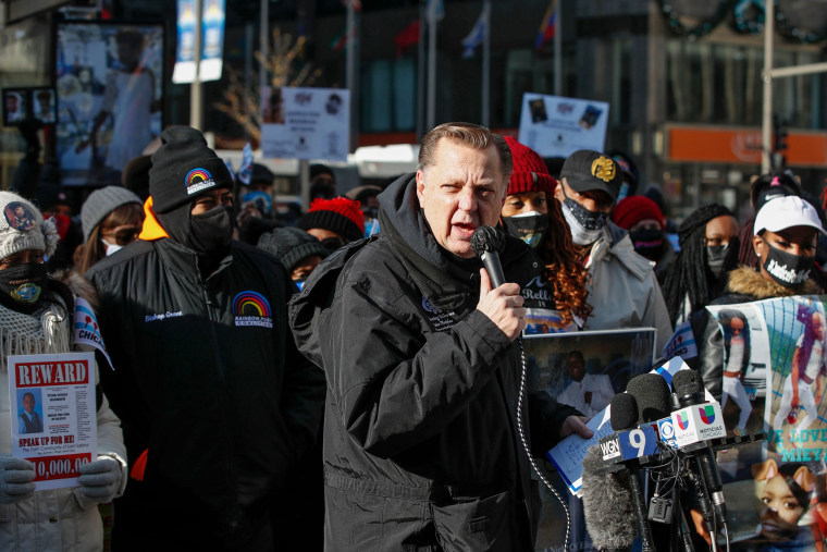 Activist Catholic Priest Rev. Michael Pfleger speaks before anti gun violence march on the Magnificent Mile in Chicago on Dec. 31, 2020.