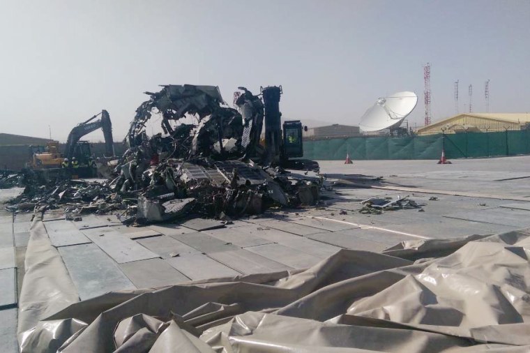 Image:  A  G222 destroyed for scrap sits on the tarmac at Kabul International Airport in Afghanistan.