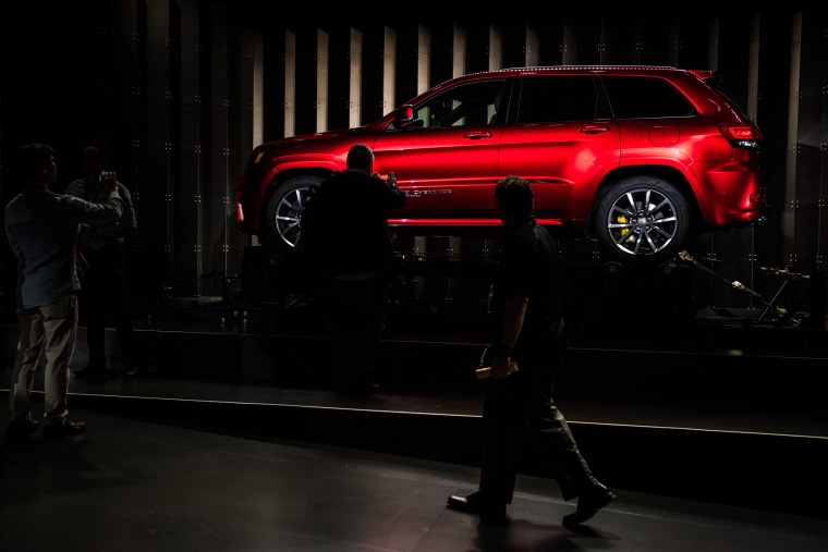 Image: Attendees take photos of Jeep Grand Cherokee Trackhawk during the  New York International Auto Show