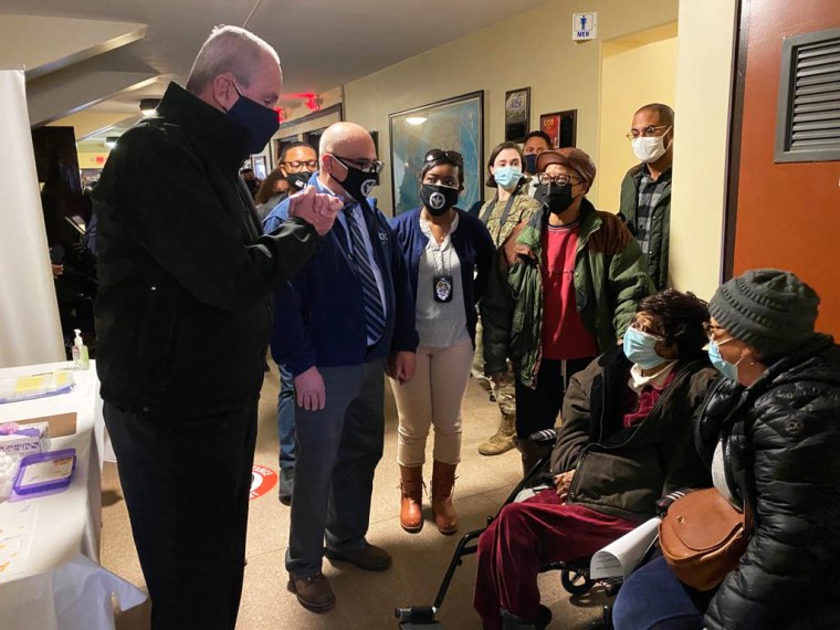 New Jersey Gov. Phil Murphy meets Carrie Raymore and family.