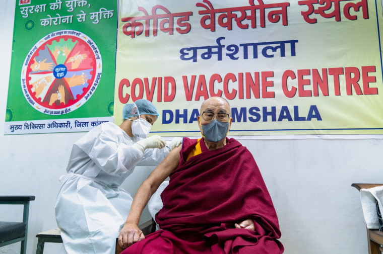 Image: The Dalai Lama receives a dose of coronavirus disease (COVID-19) vaccine at a vaccination centre in Dharamsala