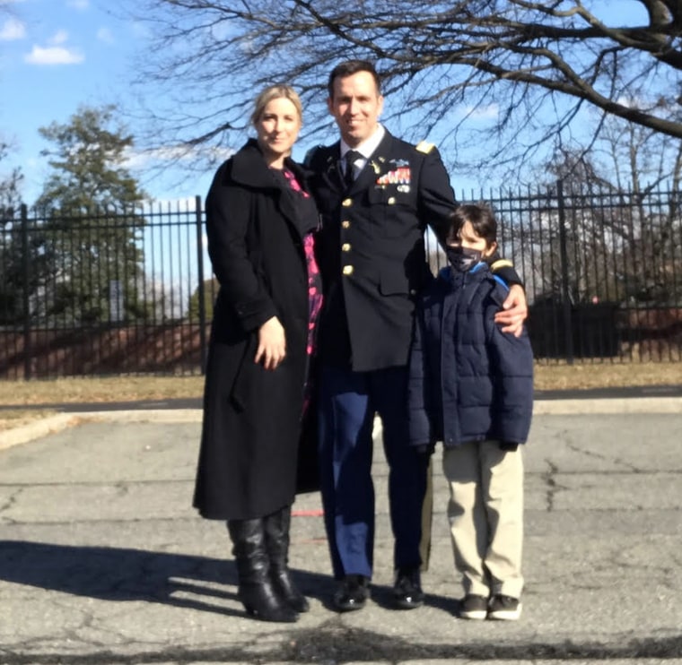 Carol Lee with her son Hudson, and her husband, Lt. Col. Ryan Harmon.
