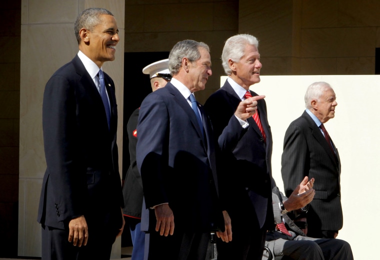 Then-President Barack Obama, former President George W. Bush, former President Bill Clinton, and former President Jimmy Carter attend the opening ceremony of the George W. Bush Presidential Center April 25, 2013 in Dallas, Texas.